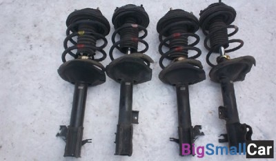 Стойка аммортизатора ниссан Икстреил 2010